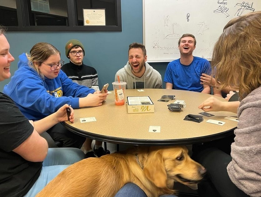 Members of NKU Chem Club playing a game and laughing during Trivia Night