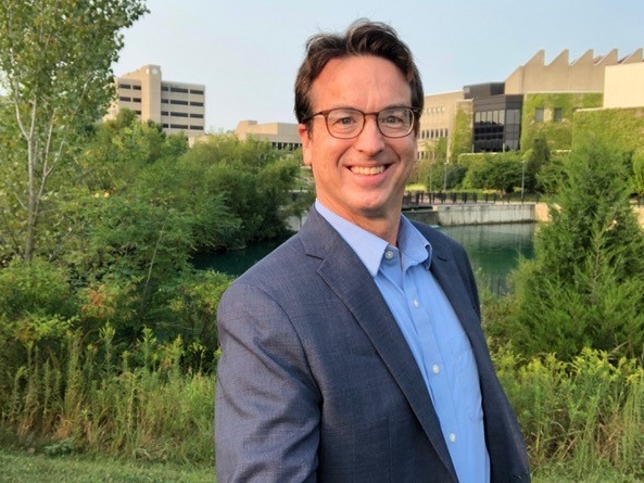 Matt Albritton in front of lake