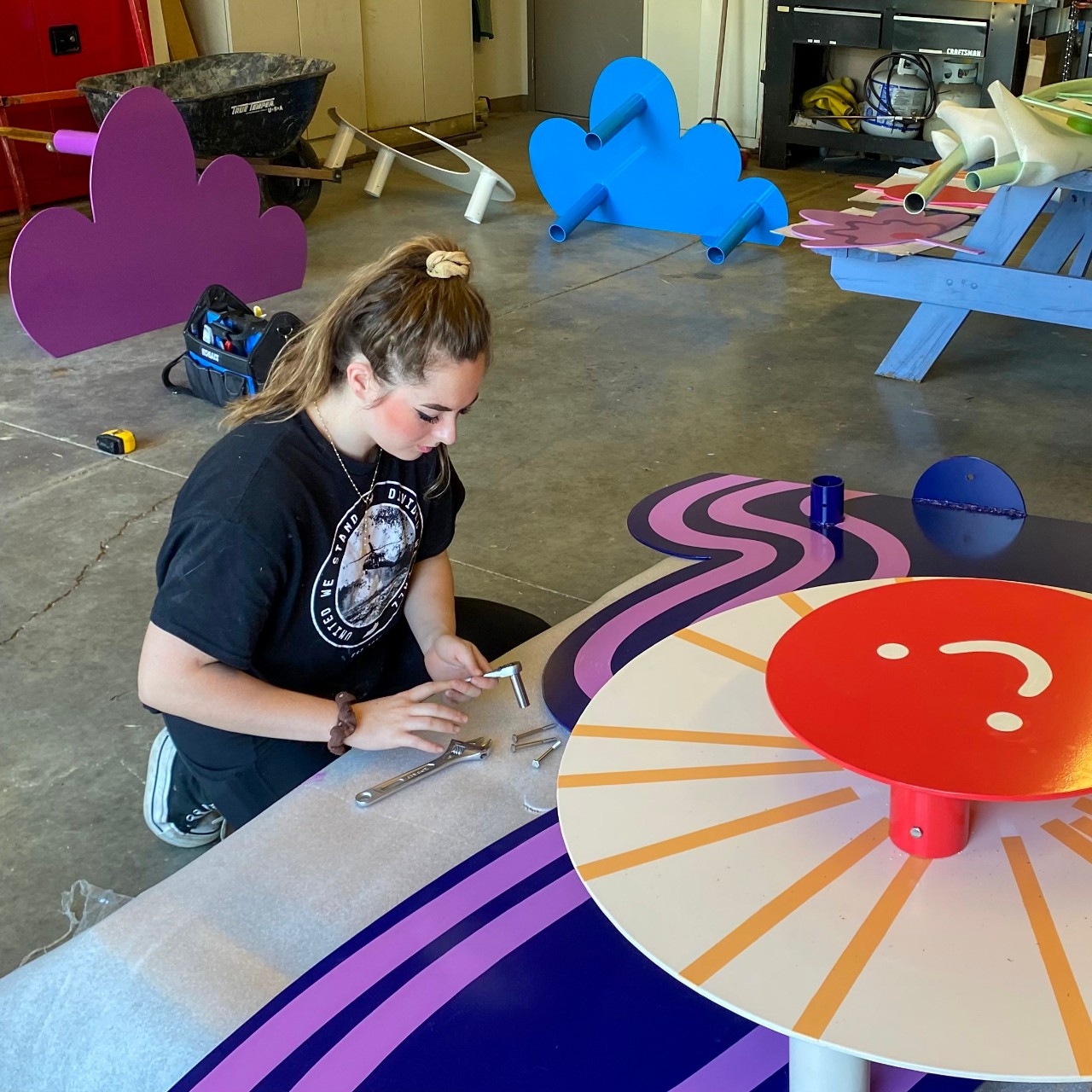 Artist working on sculpture