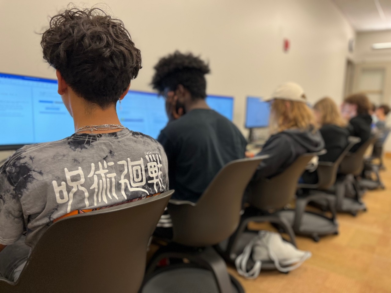 Exploring Cloud and Edge Computing Academy Teens doing computer science activities in a computer lab