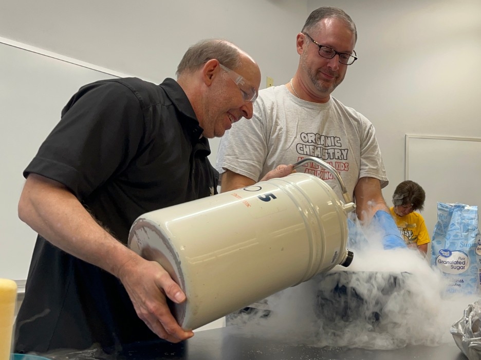 NKU Chemistry faculty having fun experimenting with liquid nitrogen