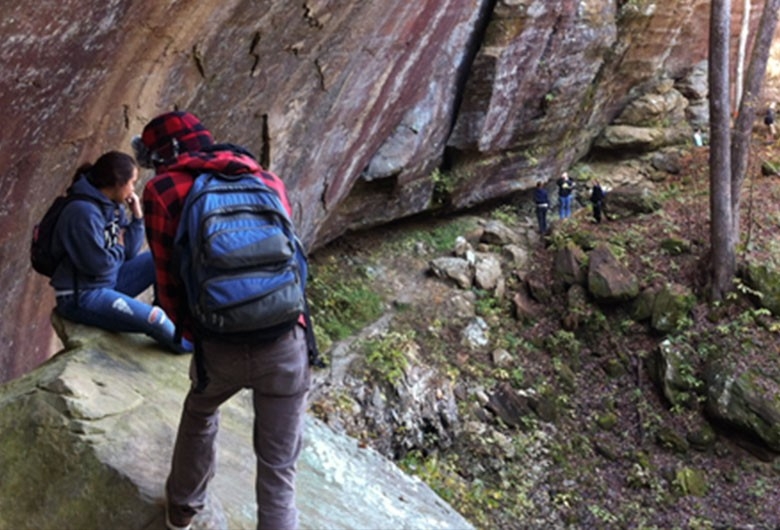 Student's in a cave