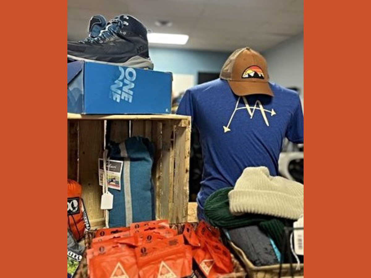 store display of shoes, shirt and hats from store