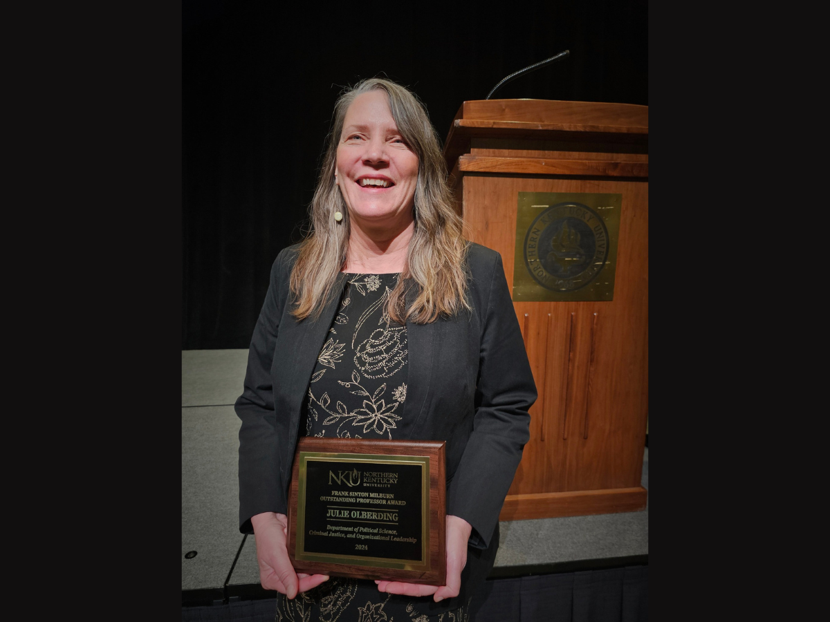 Dr. Julie Olberding with the Milburn award