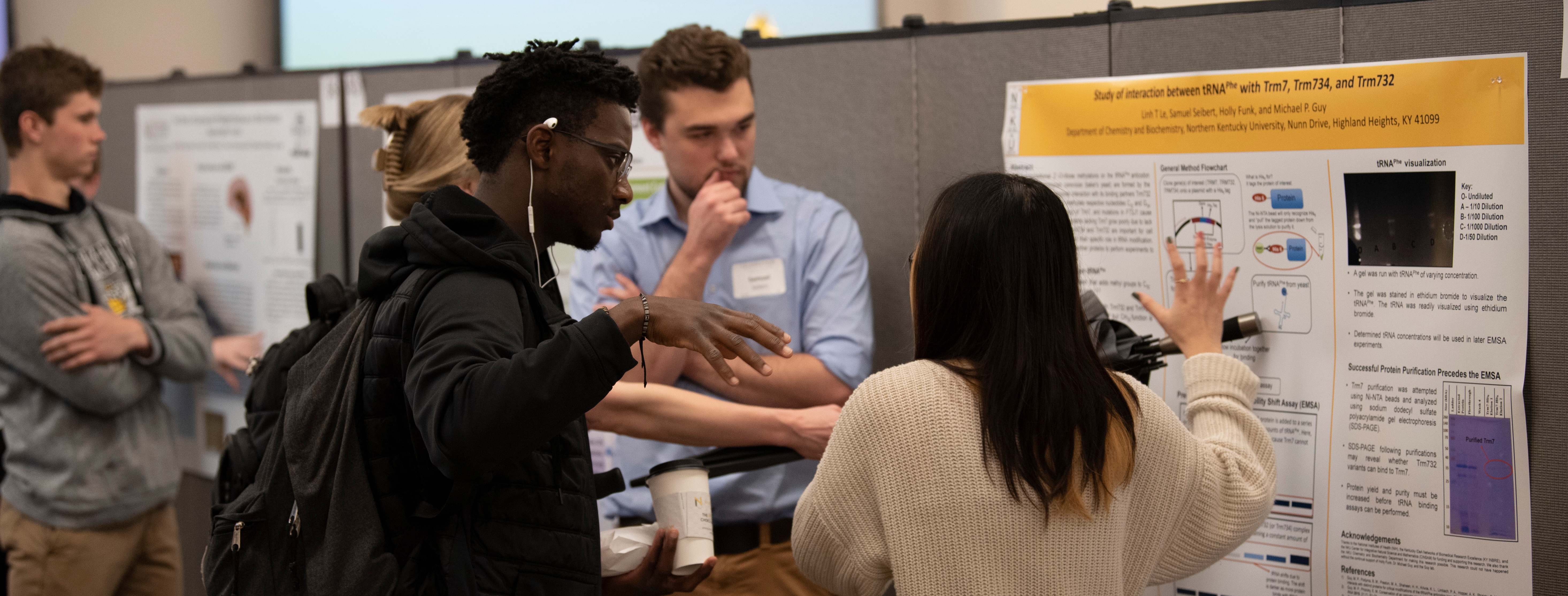 Students presenting research to fellow students
