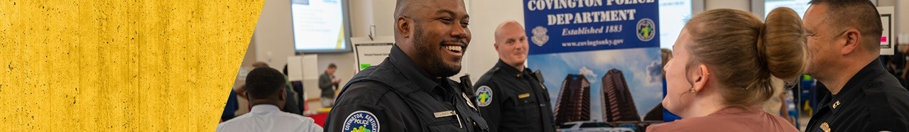 Police officers greeting students