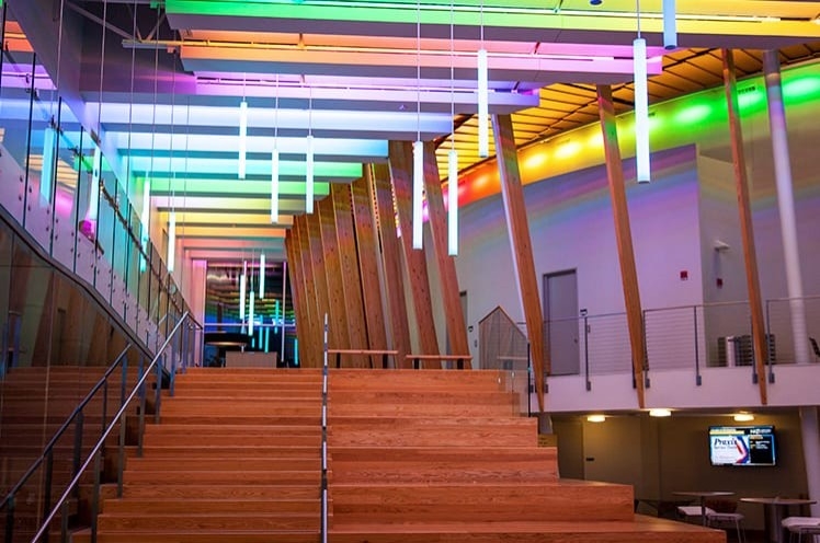 wooden stairs and rainbow lights