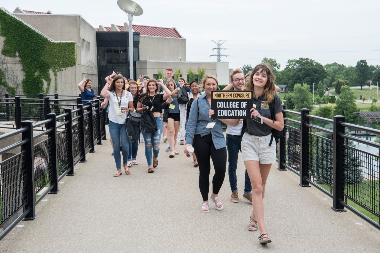 Students walking campus during orientation
