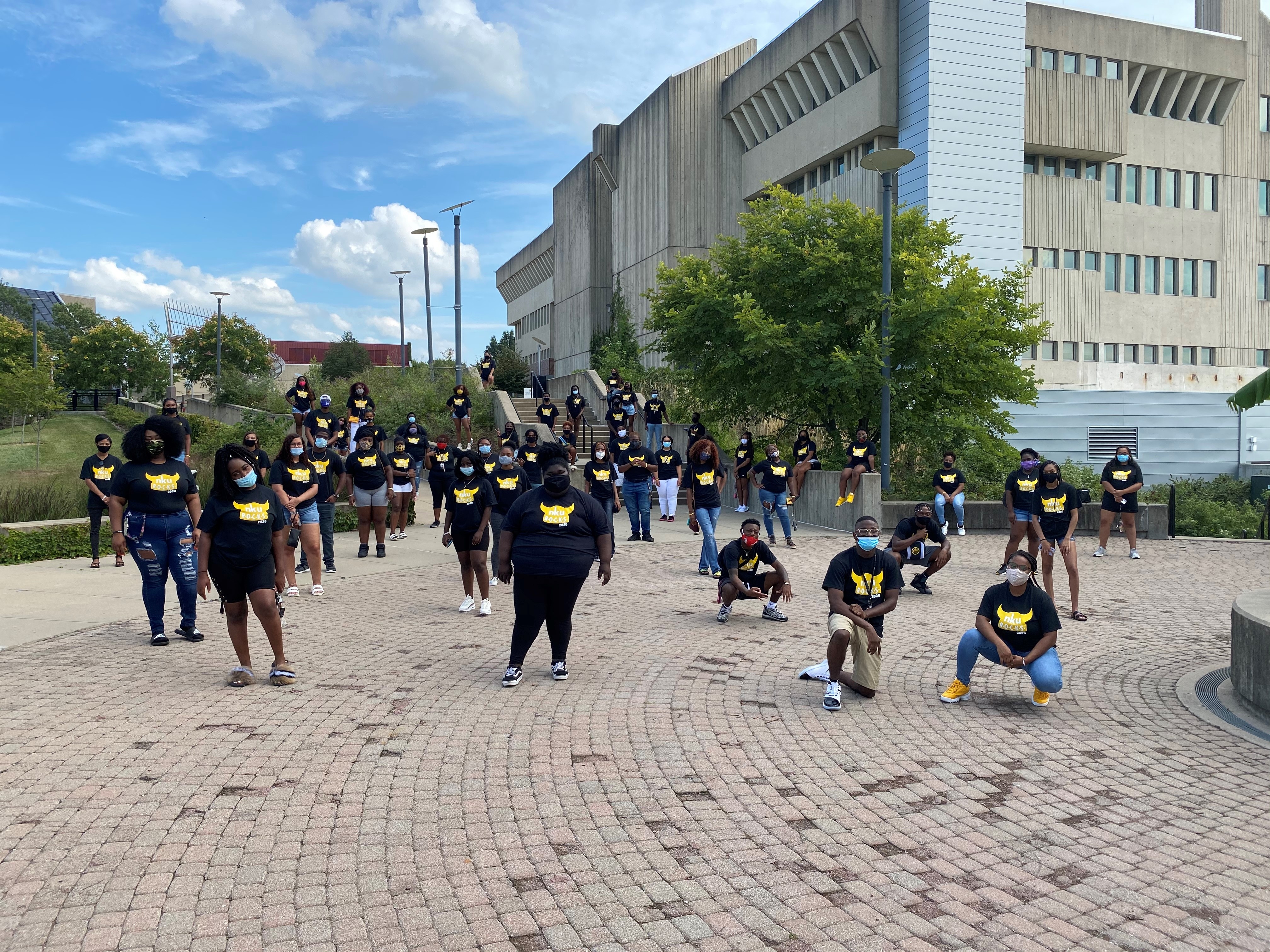 Group of African American students social distancing