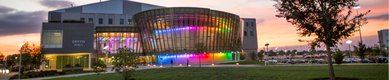 The COI building lit up at night