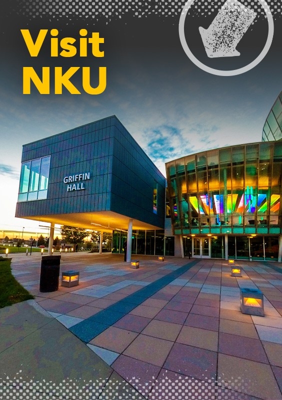 Visit NKU: Griffin Hall on NKU campus lit up with colorful lights at dusk