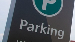 A close-up image of a parking sign