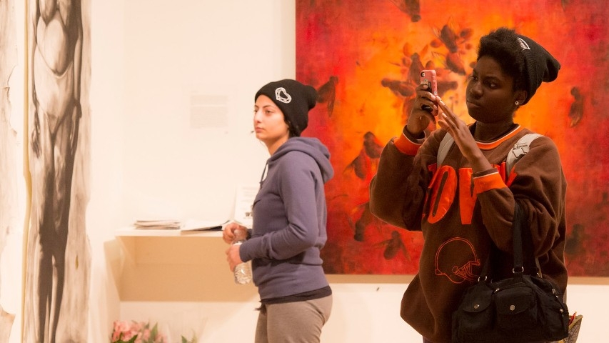 Students view an exhibit in the SOTA gallery