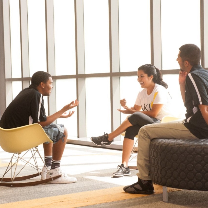 Students talking inside campus rec