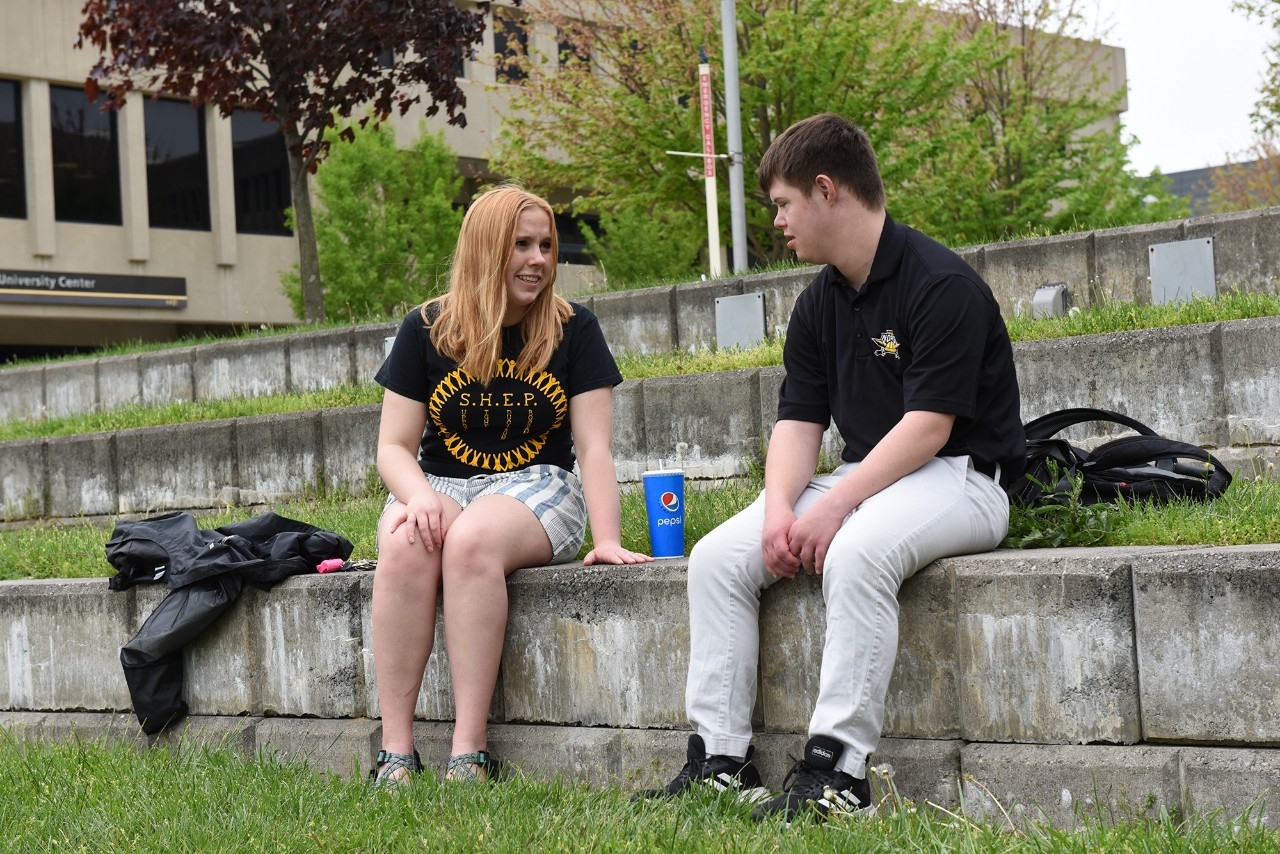 Three students standing together