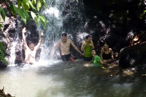 enjoying waterfall