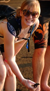 Diana Barrett holding a baby sea turtle