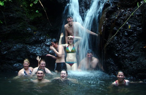 everyone underneath the waterfall