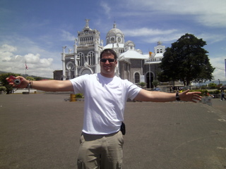osniel posing in front of basilica