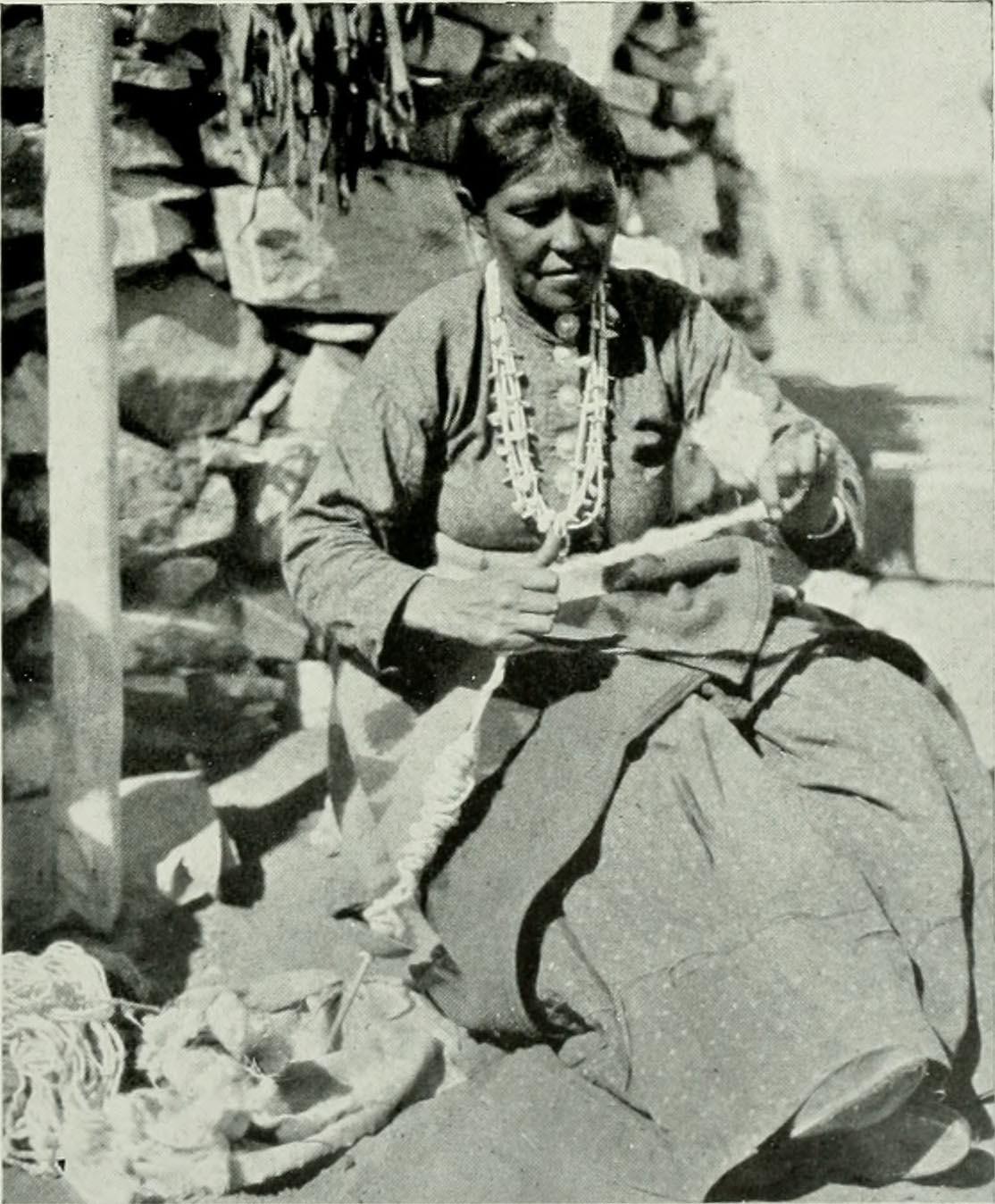 Navajo Woman Spinning Wool