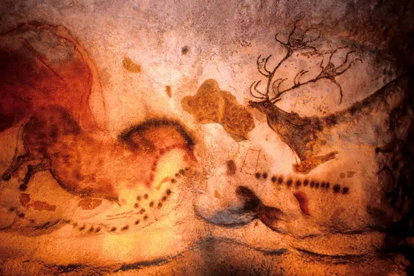 Geometric shapes appear below the Megaloceros, a giant extinct deer, in the Lascaux, France, cave paintings, which are thought to be 17,000 years old.